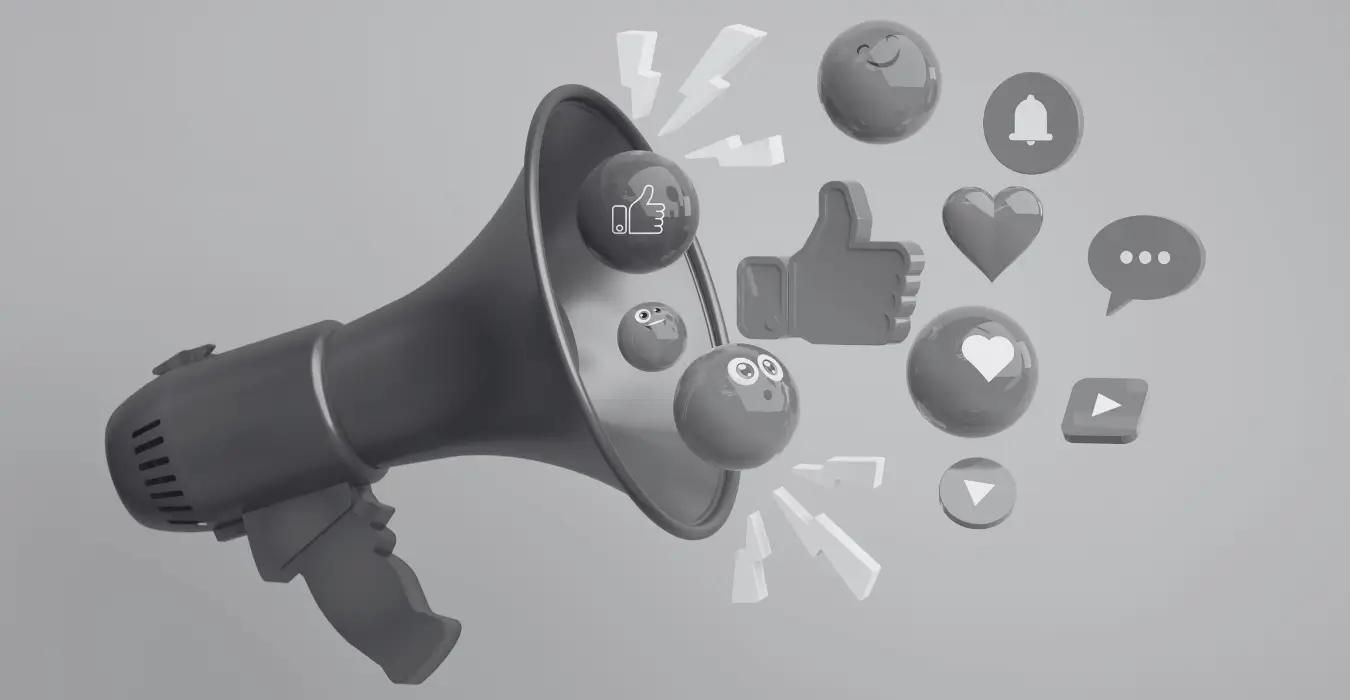 3D-Illustration eines Megafons, aus dem Social-Media-Icons (Likes, Herzen) strömen, Symbolbild für digitale Reichweite im Vergleich zur Wirkung eines physischen Giveaway.