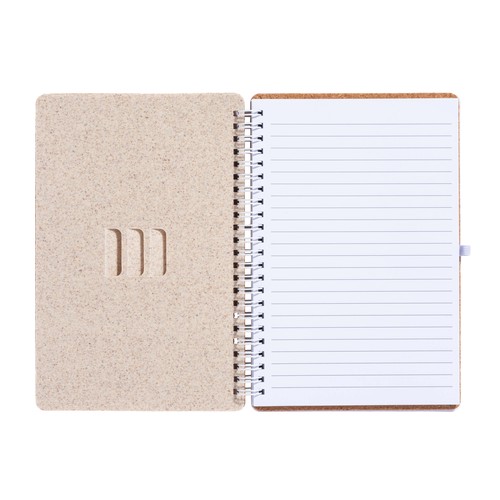 Carnet à anneaux en liège transformable en support pour téléphone portable.