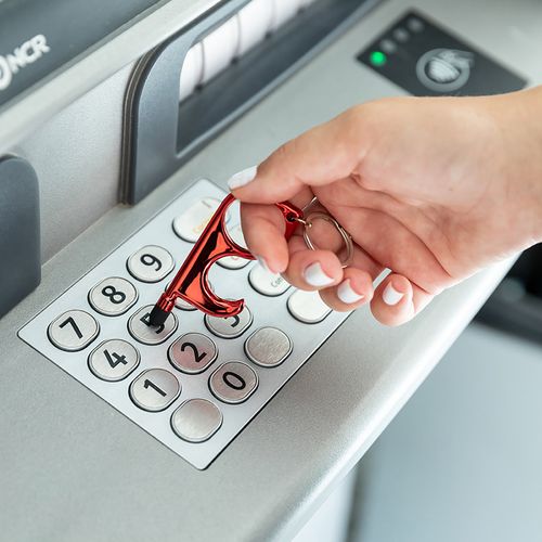 Otwieracz z uchwytem na klucz