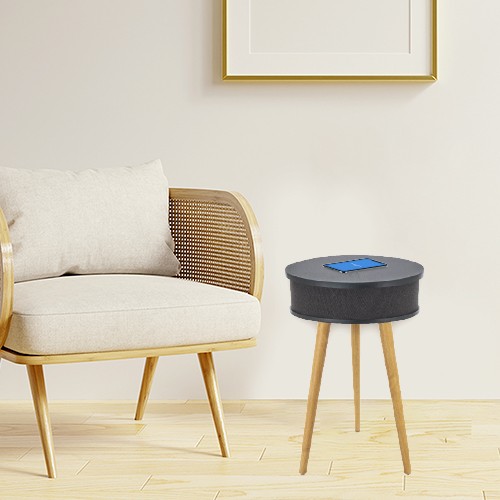 Mesa de centro con altavoz y cargador. Green Bay